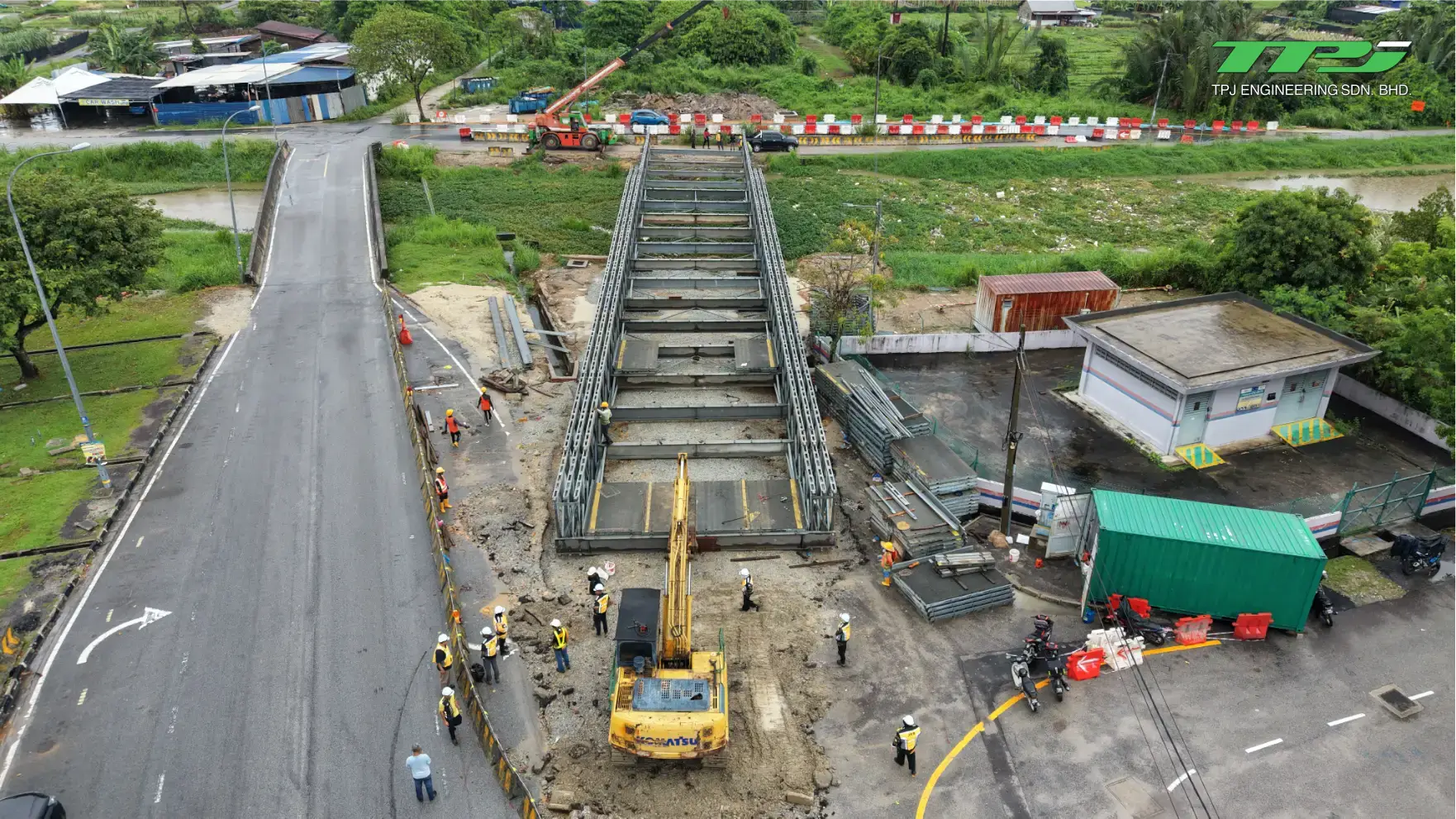 Aerial view of bridge deck construction, plant and traffic beside the Carrefour crossing in Seberang Jaya.
