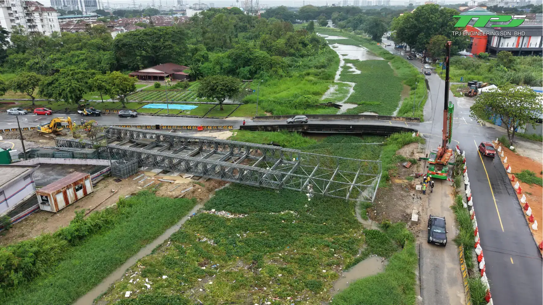Aerial view of the temporary Bailey bridge spanning the river beside the Carrefour road crossing in Seberang Jaya, Penang.