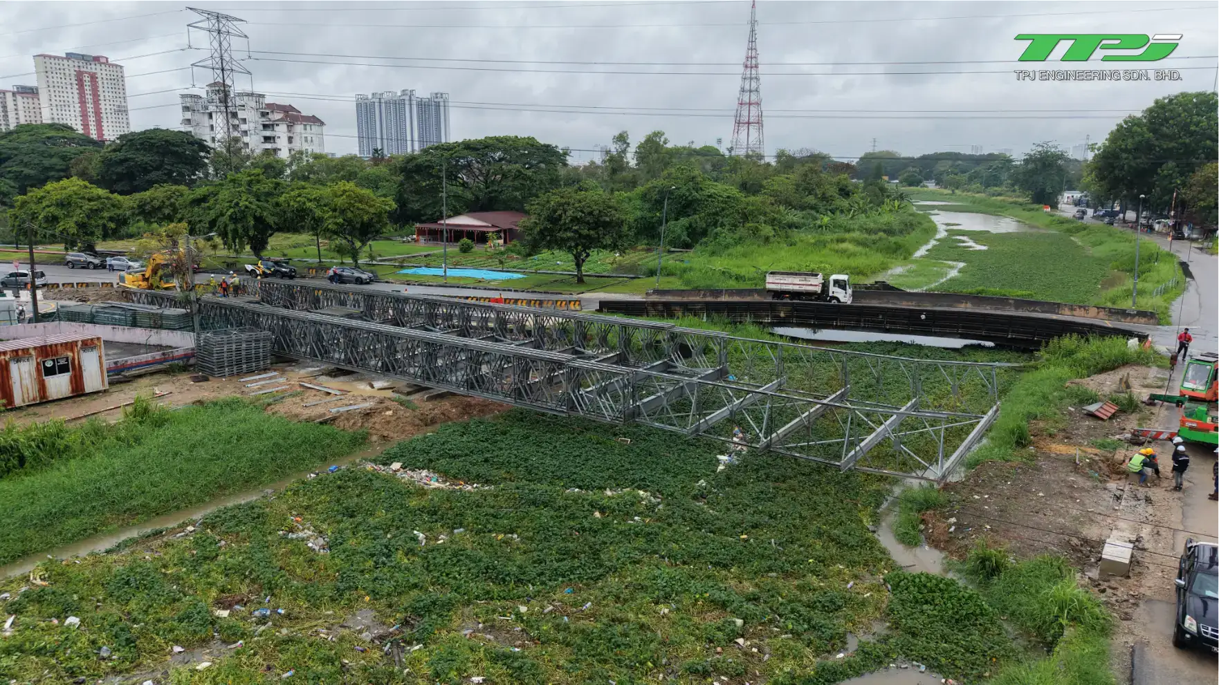 Aerial view of the temporary Bailey bridge and riverside construction area near Carrefour in Seberang Jaya, Penang.
