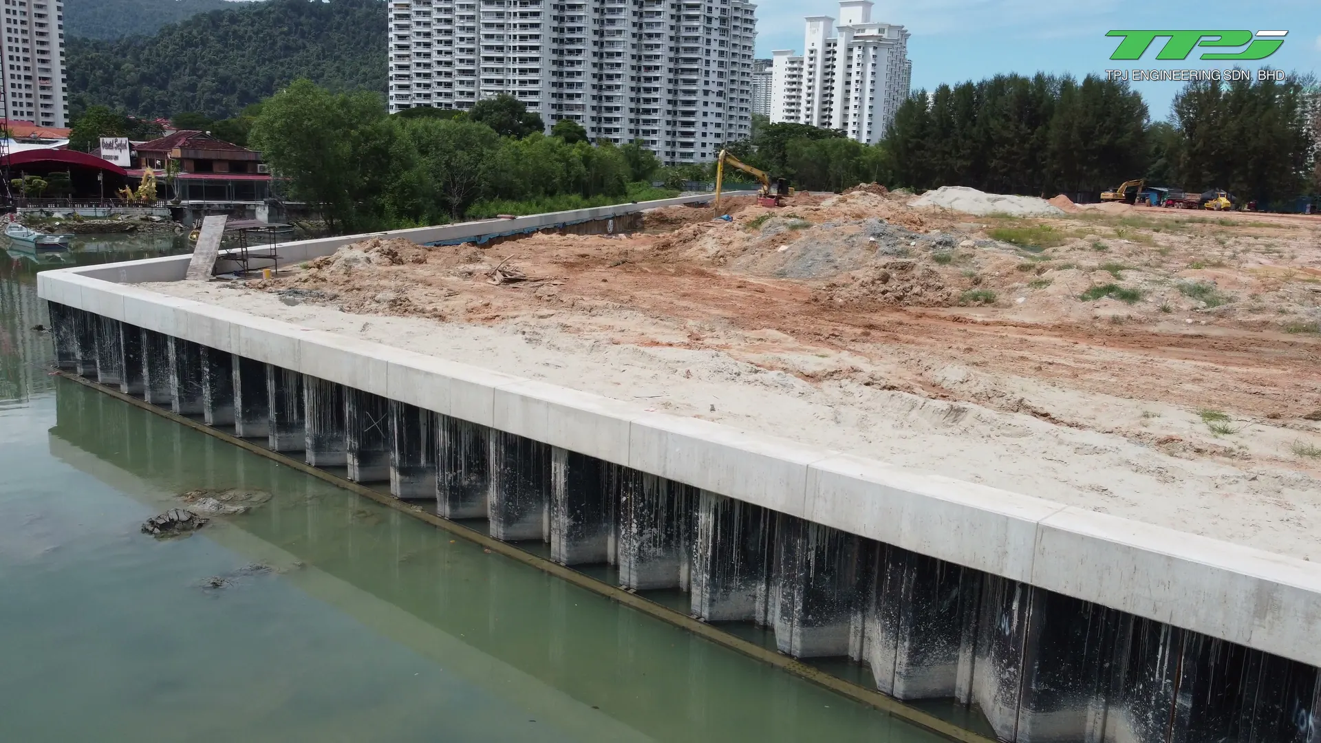 Excavation and earthworks behind the sheet-pile perimeter wall at Water Body A, Gurney Bay