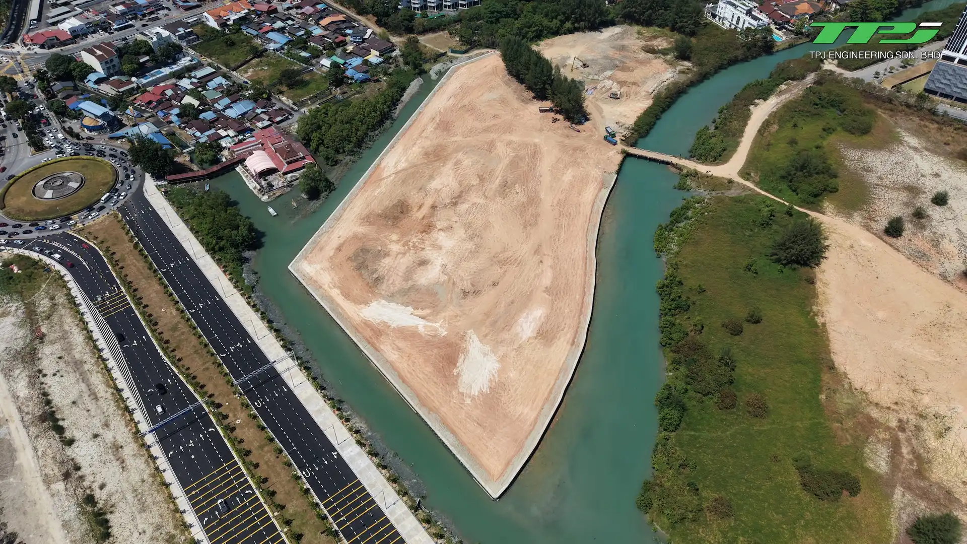 High aerial view of the completed Water Body A reclaimed platform at Gurney Bay